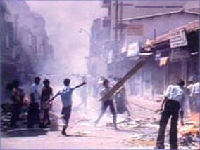 Sinhala mob set fire to Tamil shops July 1983