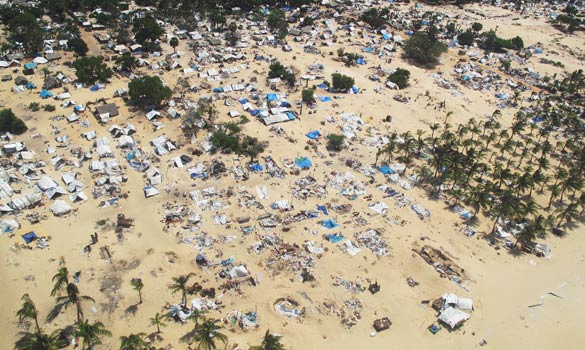 Civilian tents Vanni 'Safe Zone' May 26 2009 taken during SG Ban Ki-moon's helicopter flight Mullaitivu beach Sri Lanka