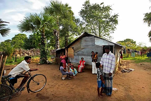 The Muvaga Swaran family at their temporary home near Trincomalee. They were displaced from the Vanni area following the final battle between the LTTE (Tamil Tigers) and the Sri Lankan military. They were in the Manik Farm IDP camp in Vanni for five months before being released a few weeks ago Dec 2009