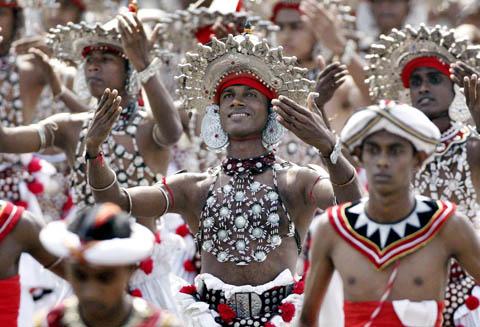 Sri Lankan traditional dancers perform during the 59th national Independence Day celebrations in Colombo, Sri Lanka, Sunday, Feb. 4, 2007. (AP Photo/Eranga Jayawardena)